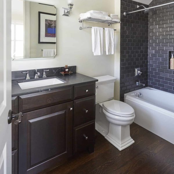 bathroom with dark wood vanity