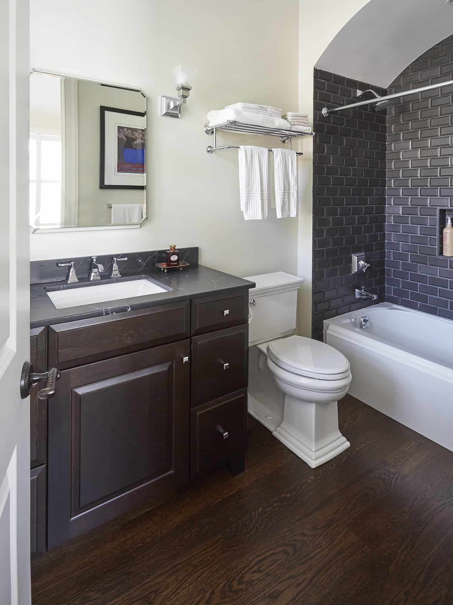 bathroom with dark wood vanity