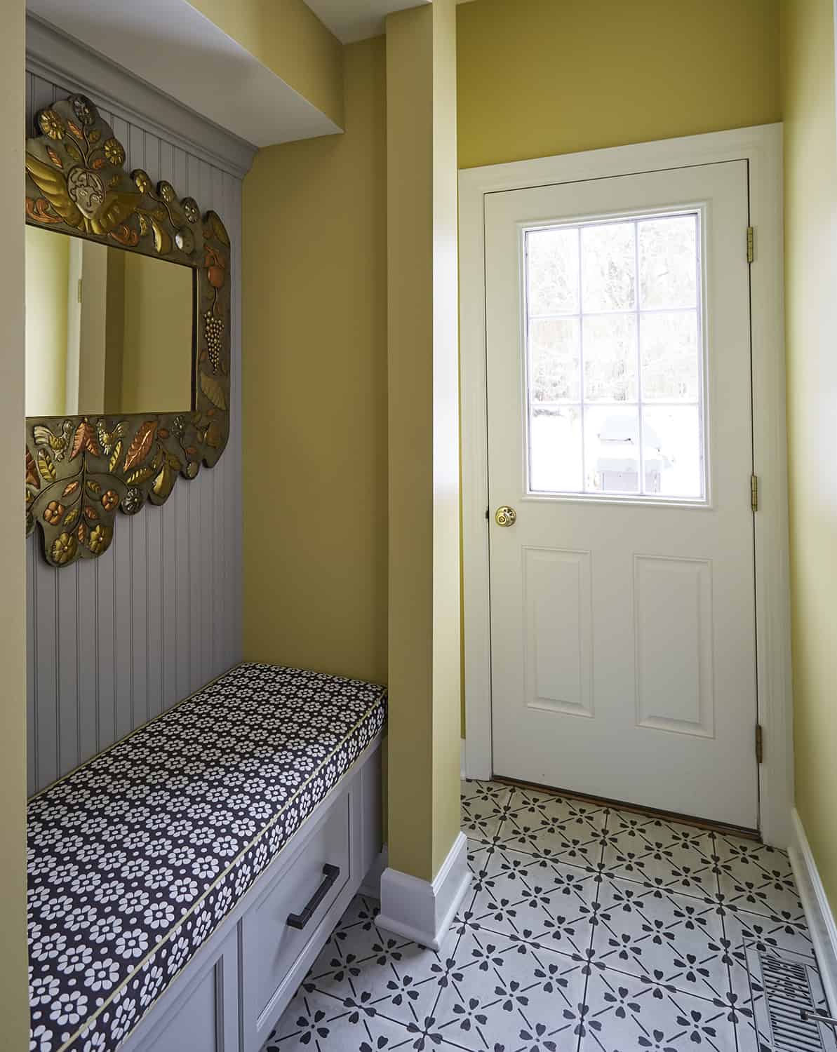 mudroom with built-in bench seating