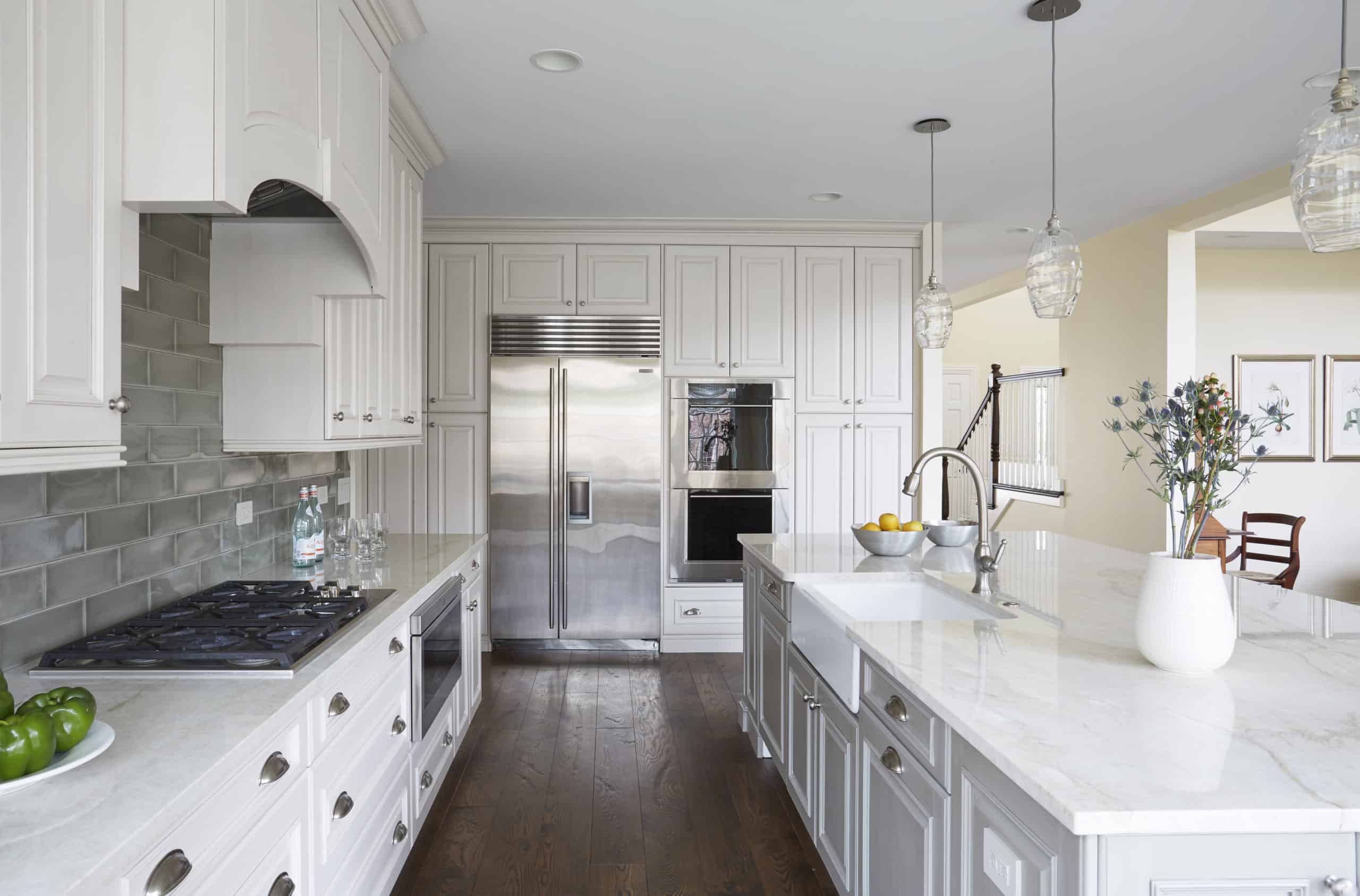classic white kitchen cabinets by orren pickell