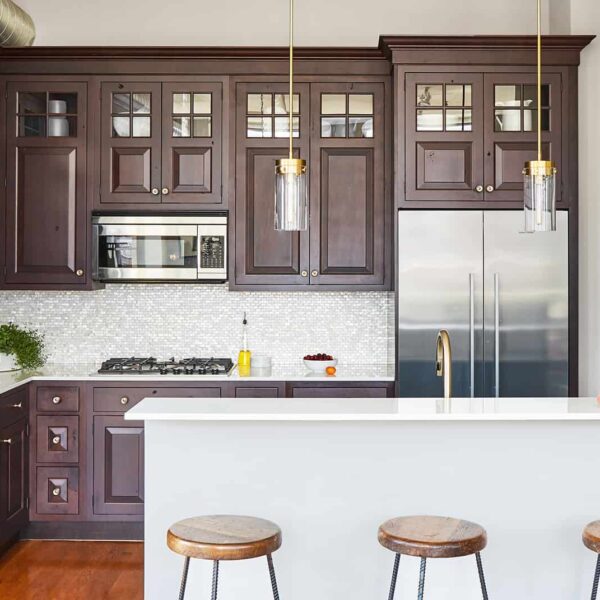 dark wood cabinets with partial glass front uppers