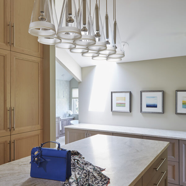 glass pendants over dressing room island