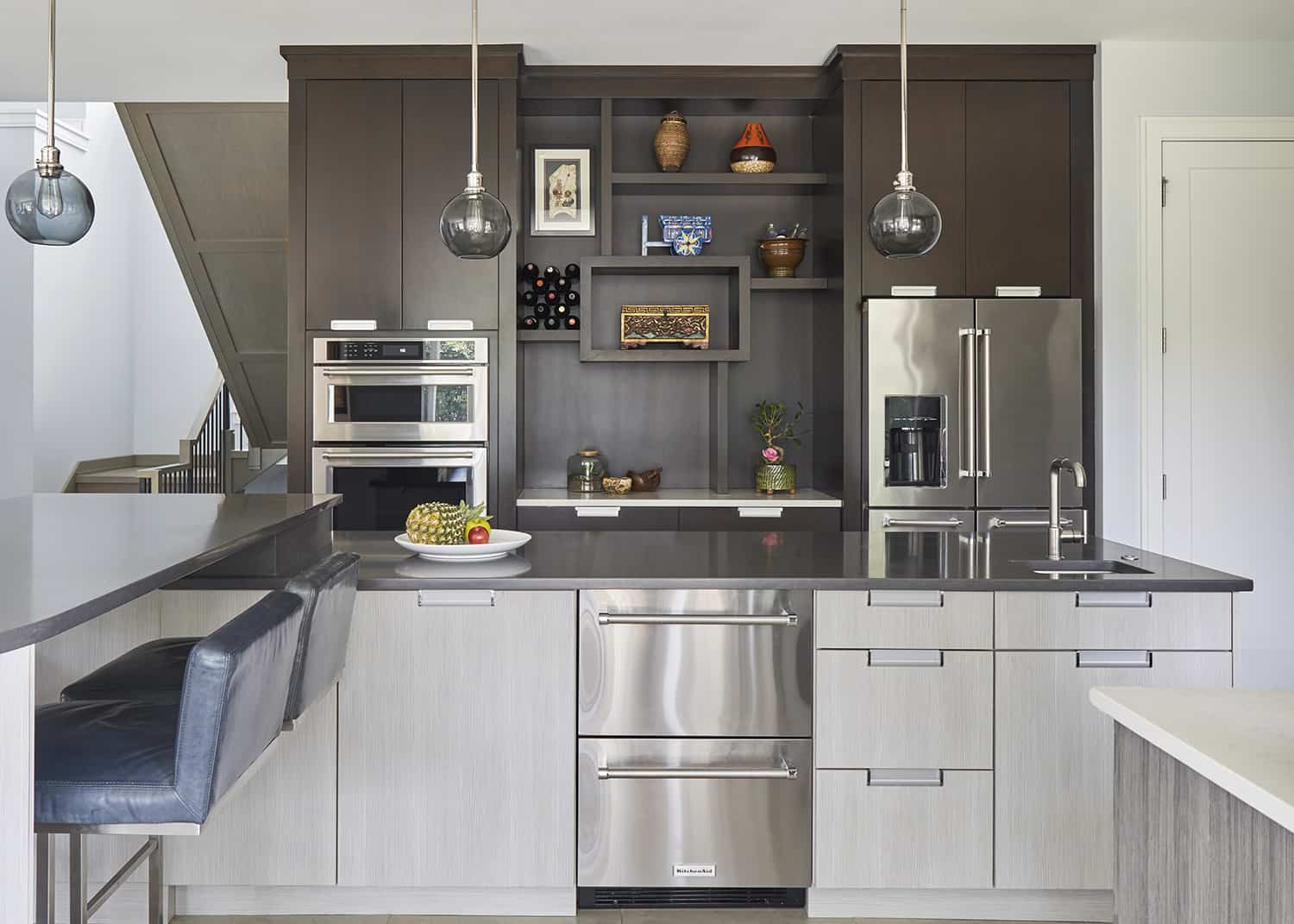 contemporary display cabinetry on oven wall