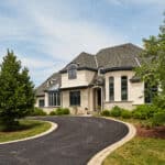 sweeping driveway to french country estate