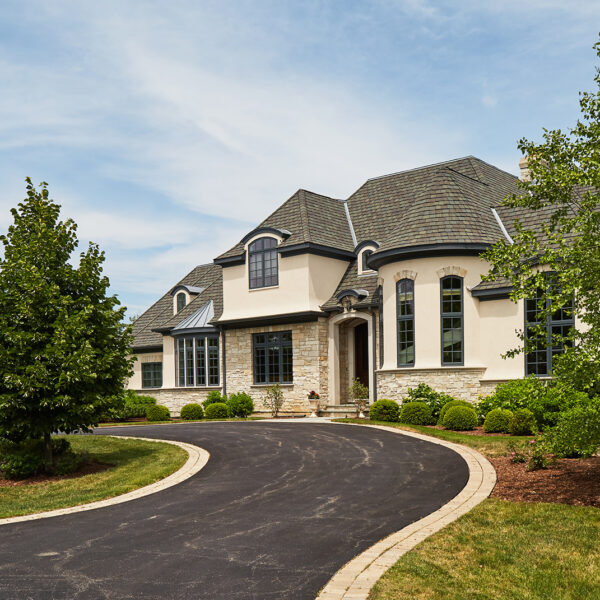 sweeping driveway to french country estate