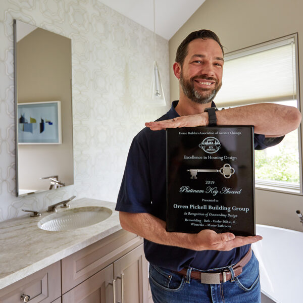 rob oldenburg holding platinum key award