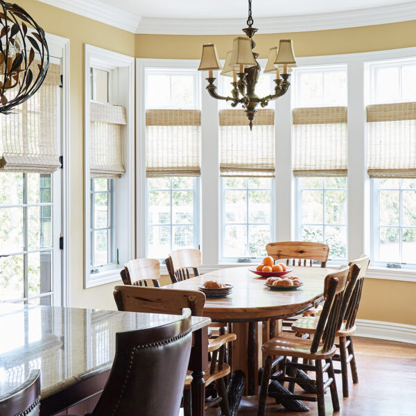 sunny breakfast room with wood table