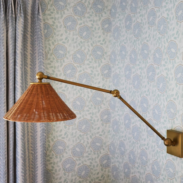 swing arm lamp with wicker shade