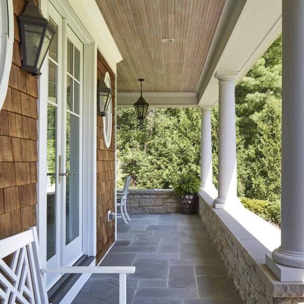 rfont-porch-detail-cedar-shake-columns-oval-windows cedar shake detail with white columns