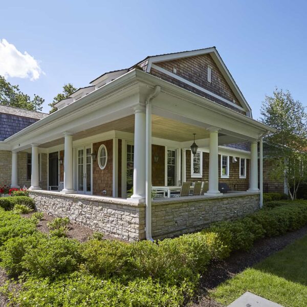shingle-style-home-orren-pickell side view of covered porch