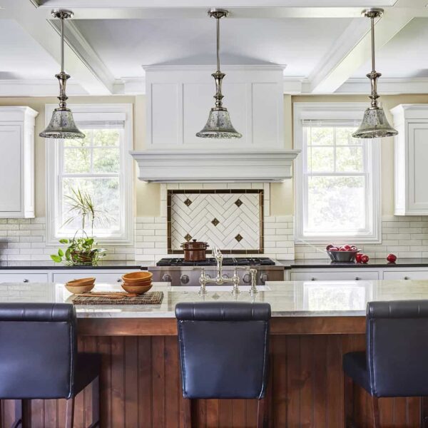 white-traditional-kitchen-lake-forest-orren-pickell kitchen island with three pendant lights above