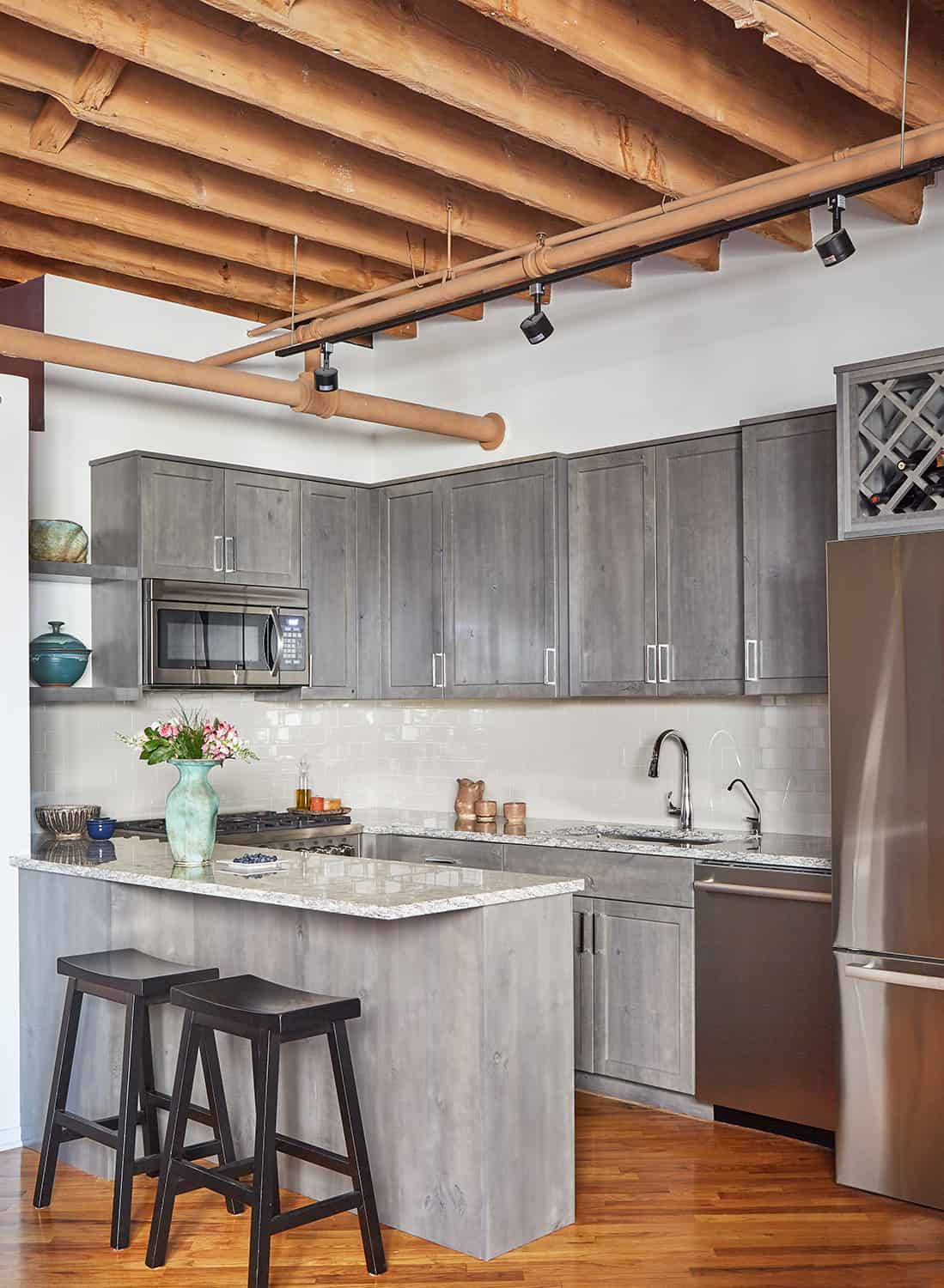 exposed joists in chicago loft kitchen