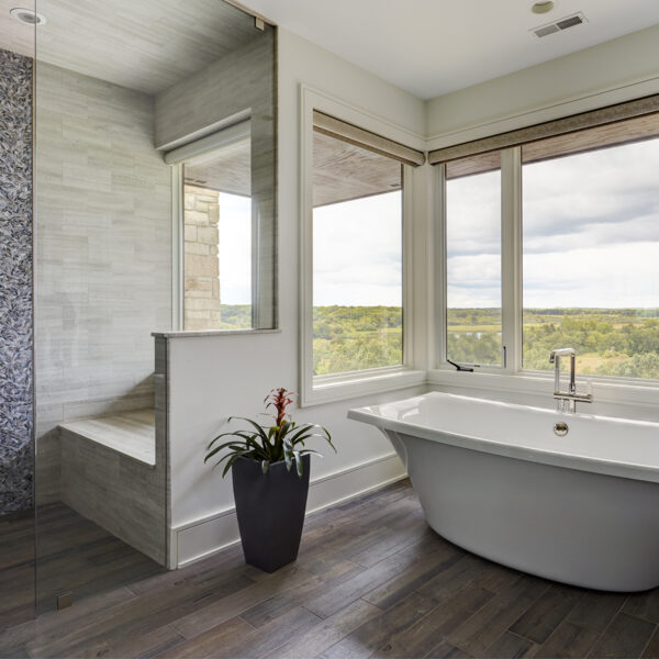 freestanding-tub-with-view freestanding tub in front of windows