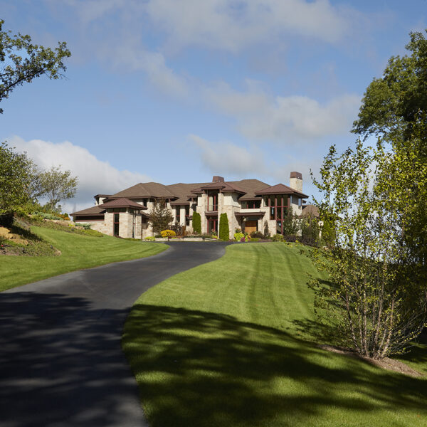 front-elevation driveway approach to house
