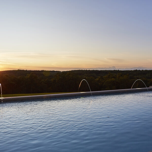 pool-at-sunset sun setting over pool