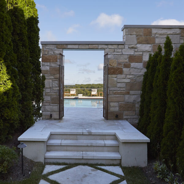 stairs-to-pool-stone-wall steps to pool