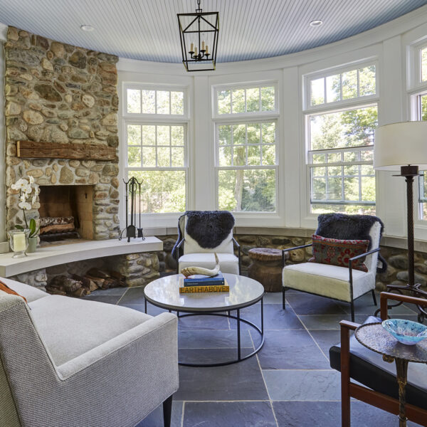 stone-fireplace-porch-addition semi circular stone fireplace