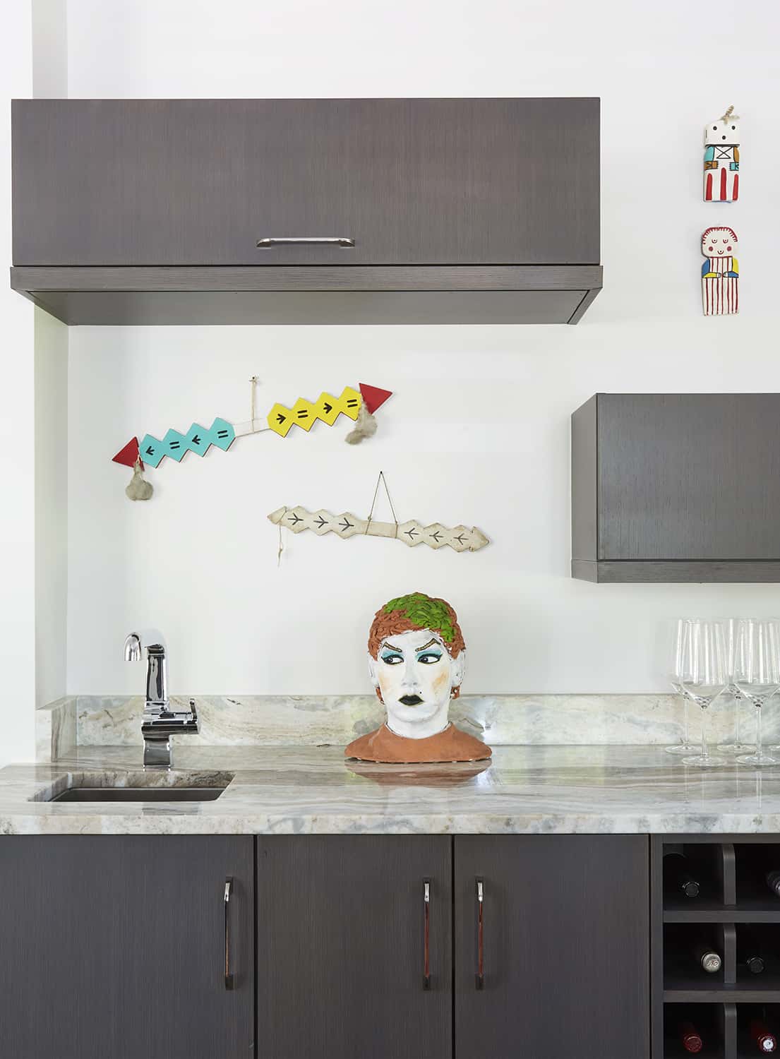 wet bar with colorful art