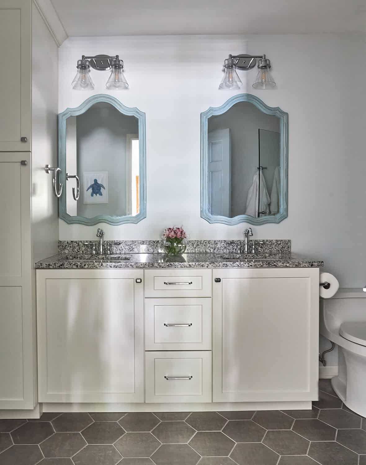 blue mirrors above vanity