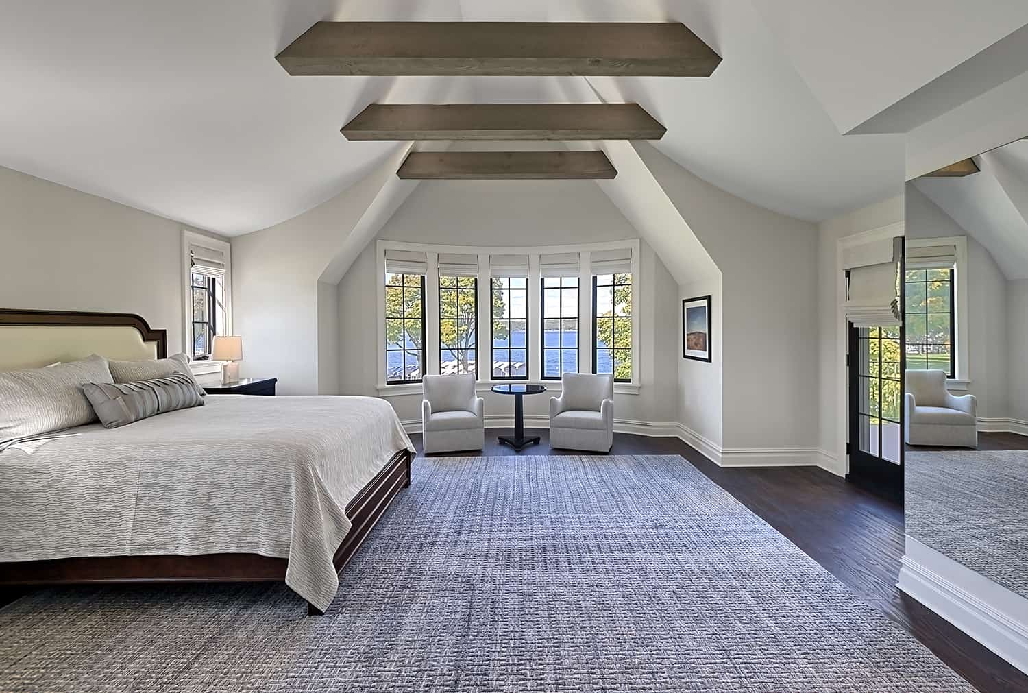 curved ceiling with exposed wood beams