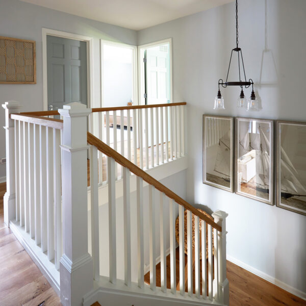 2nd floor landing with staircase that is open to below