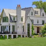 stone and stucco exterior of lakefront home