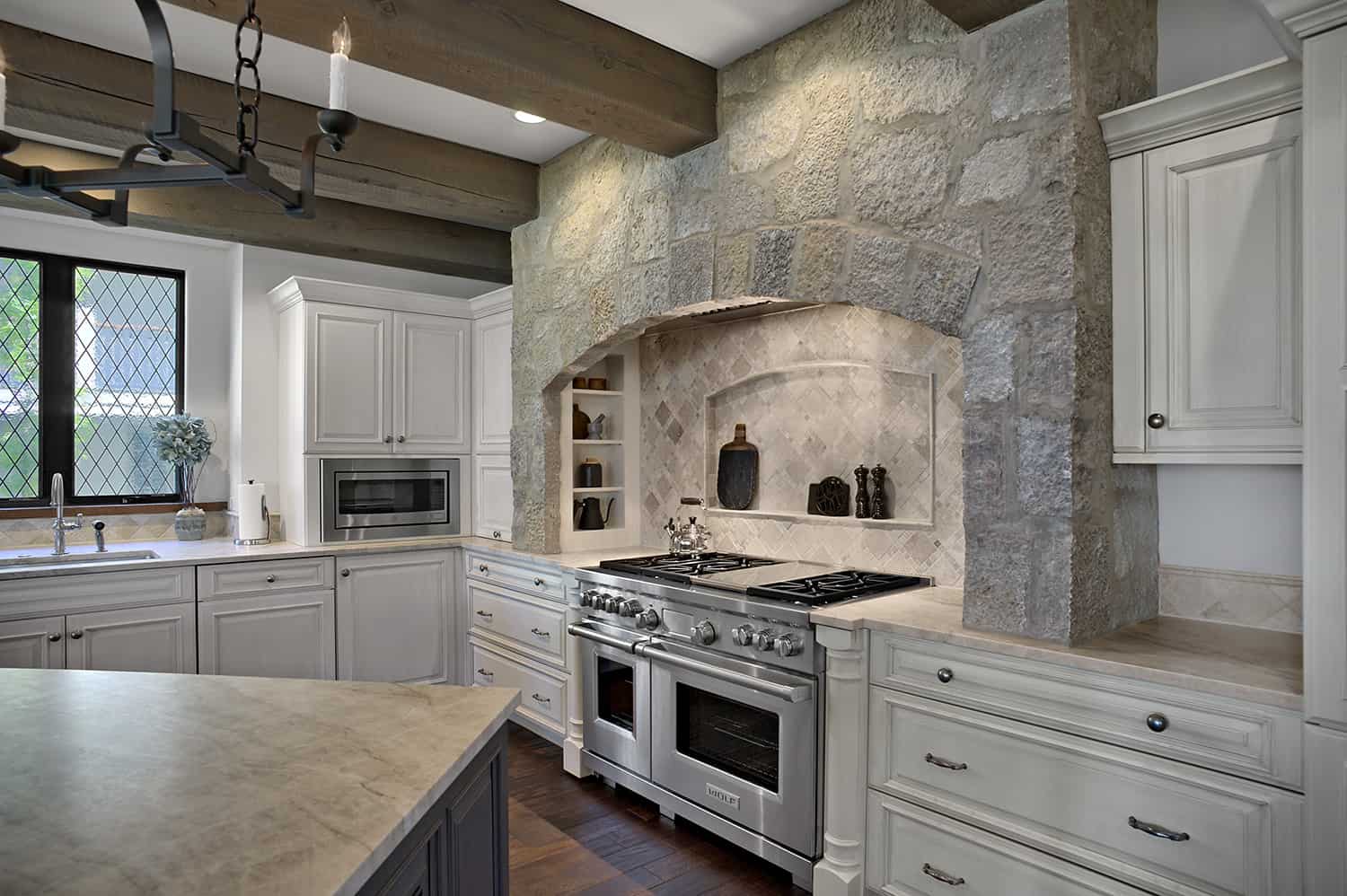 ached stone range surround with multiple niches