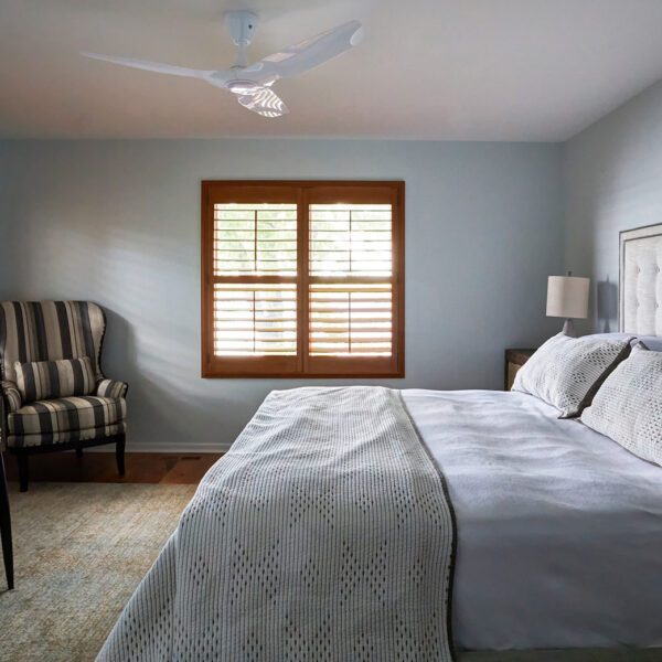 striped chair in bedroom