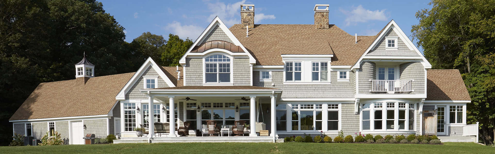 shingle style home front elevation designed and built by orren pickell building group in chesterton indiana