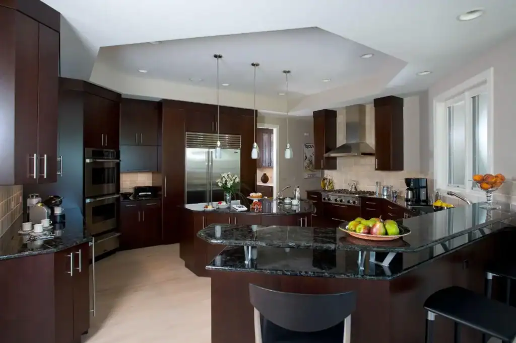Picture of a kitchen with dark cabinets