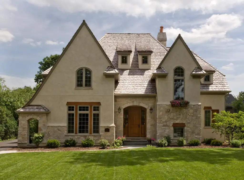 Picture of a stone and stucco exterior to build a luxury home