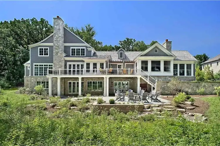 Picture of a large gray exterior showing what makes a vacation home luxury-grade Picture of a large gray exterior showing what makes a vacation home luxury-grade