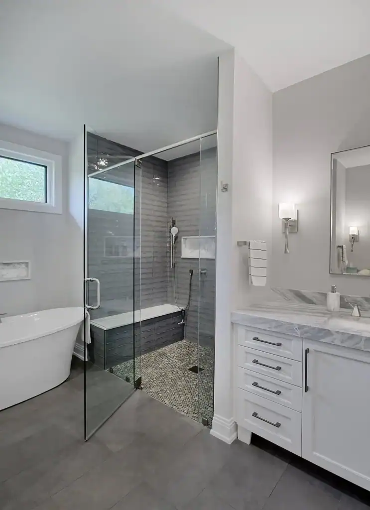 picture of a glass shower stall beside a white vanity