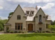 picture-of-a-large-stone-custom-home-and-questions-to-ask-a-home-builder